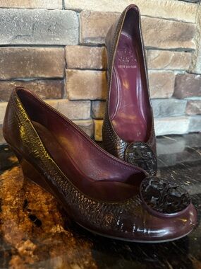 Tory Burch Patent Leather Wedge Pumps in Burgundy